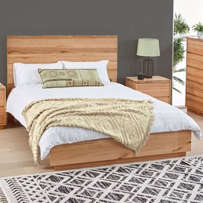 Timber bed with bedside tables